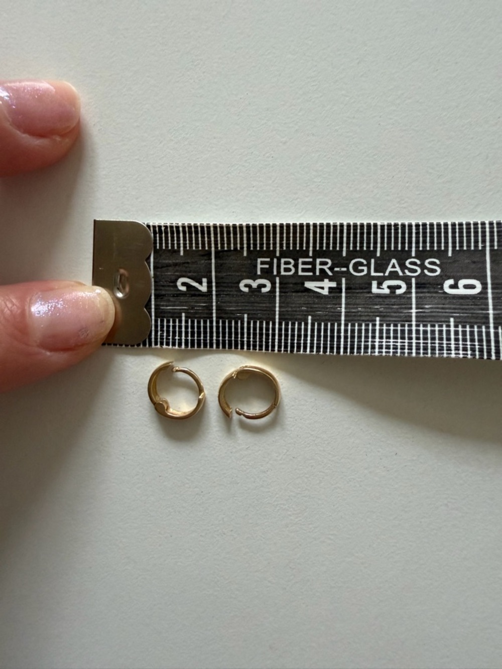 mini huggie gold earnings